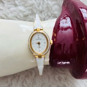 Hanowa Swiss Elegant Gold and White Bangle Adjustable Women's Watch